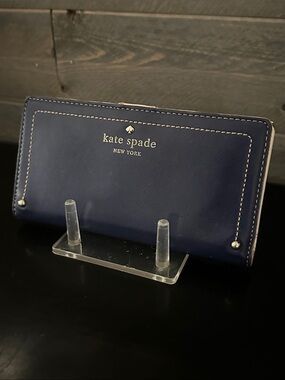 kate spade mott street navy leather bi-fold wallet with cream gold accents EUC